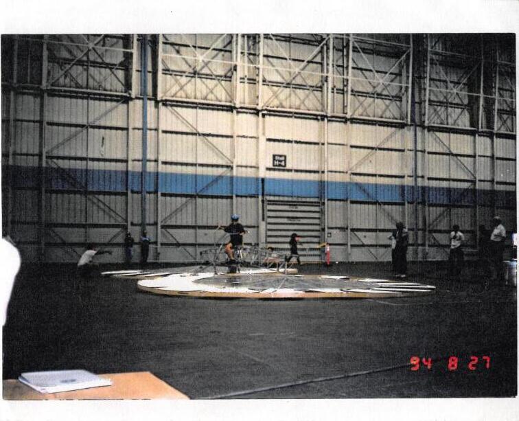 The Tipsy Bee human-powered helicopter being pedaled on the Boeing hangar floor, photo date-stamped 94-8-27.